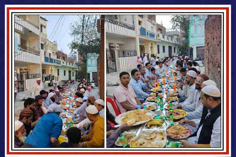 आजमगढ़ के गुरुटोला क्षेत्र में रमज़ान के दौरान लंबी पंक्ति में बैठकर रोज़ा इफ्तार करते स्थानीय लोग